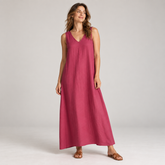 Magenta sleeveless V-neck linen maxi dress with relaxed A-line shape on a model