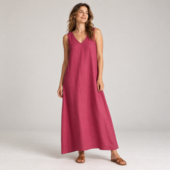 Magenta sleeveless V-neck linen maxi dress with relaxed A-line shape on a model