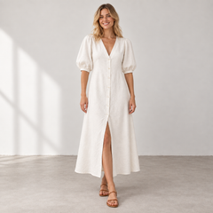 Front view of Cuirsy cream button-front linen dress with puff sleeves