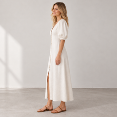 Side view of Cuirsy cream button-front linen dress